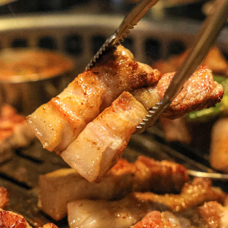 Mejor Grilled Pork en Seogwipo - 돌담흑돼지 중문점